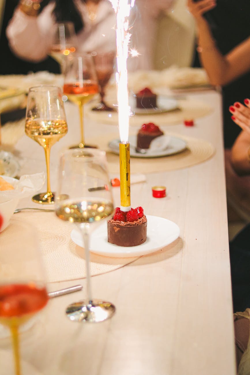 festive celebration with desserts and sparkling candles